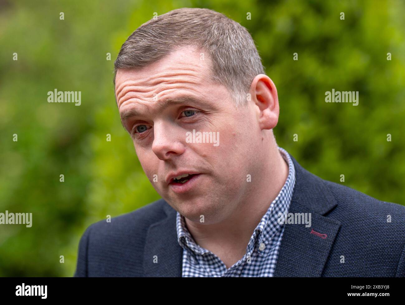 Scottish Conservatives Roles Scottish Conservative leader Douglas Ross speaks to the media in ...