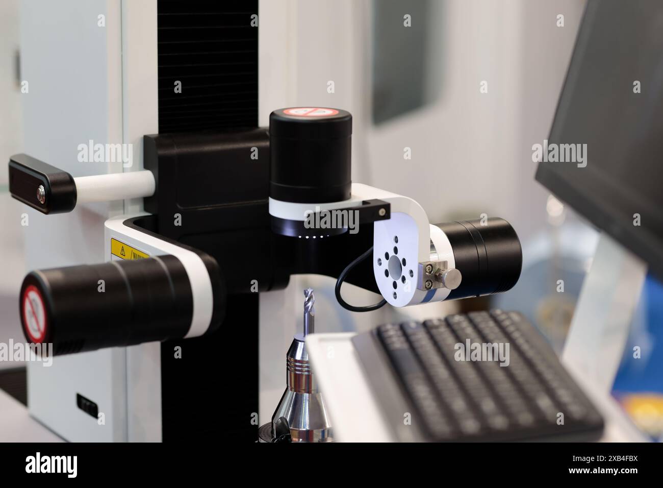 CNC tool presetting and measuring system close up. Selective focus. Stock Photo