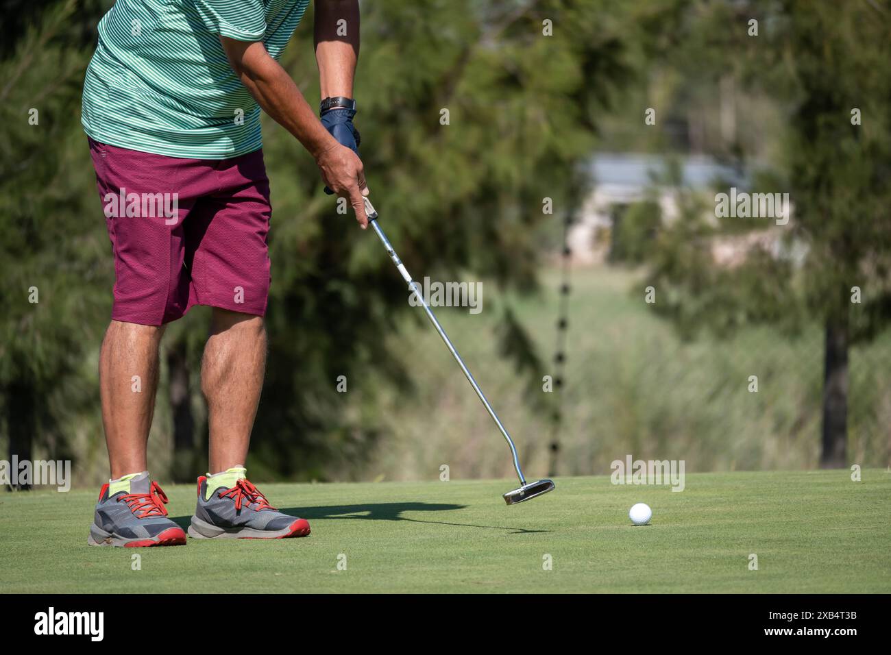 golfer shooting a golf ball Stock Photo - Alamy