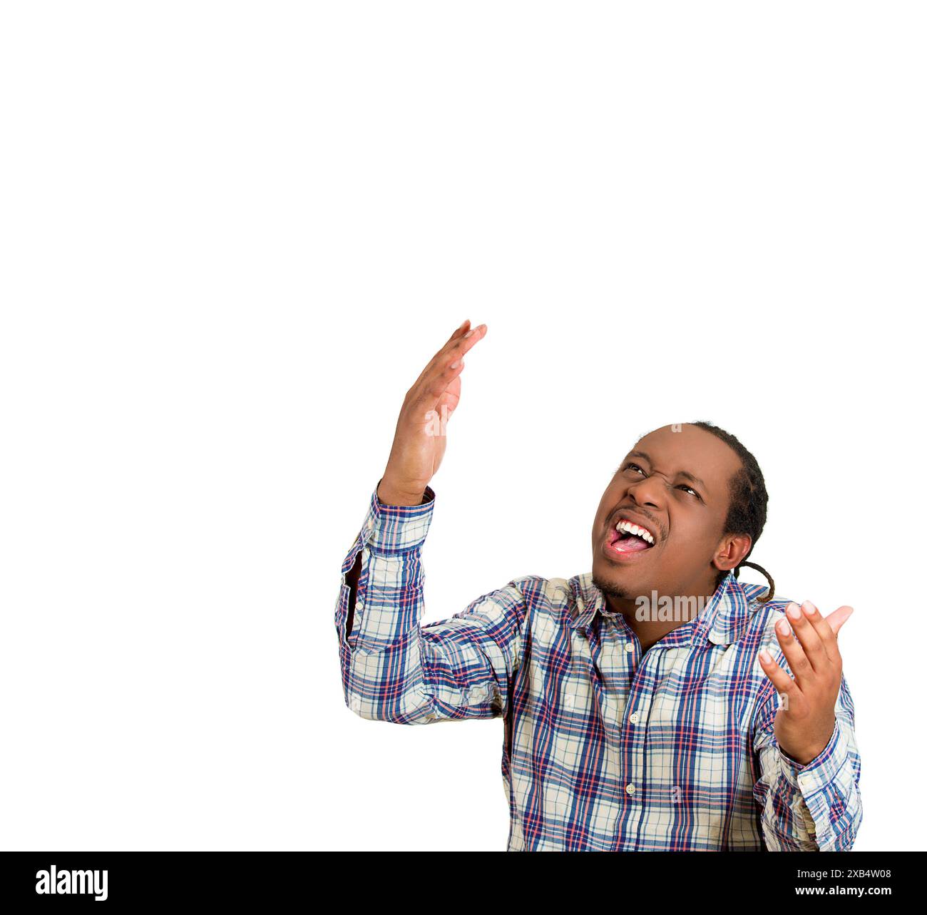 portrait of a young angry unhappy, stressed man looking up, screaming to stop making loud noise ,isolated on white background. Stock Photo