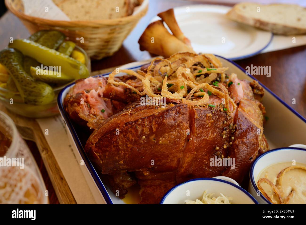 Roast Whole Pork Knuckle Czech Style with Horseradish, Mustard, Pickles