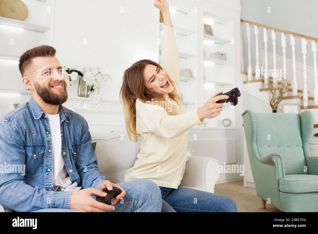 Man woman play game on hi-res stock photography and images - Alamy