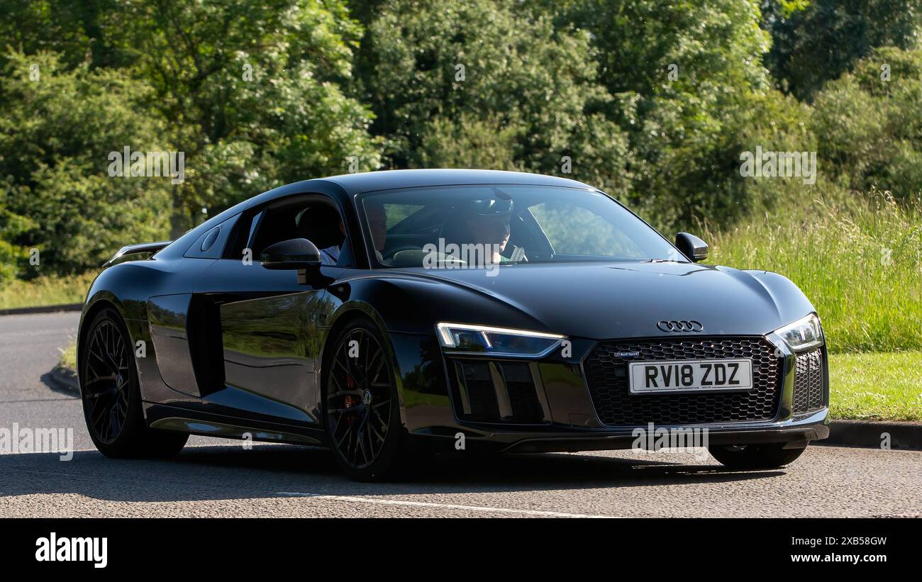 Stony Stratford,UK - June 2nd 2024: 2018 black Audi R8 car driving on a ...