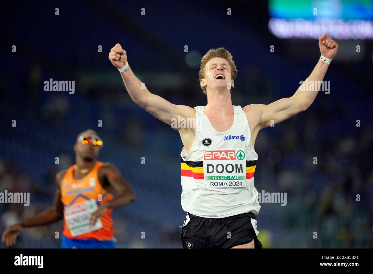Alexander Doom, of Belgium, crosses the finish line to win the gold ...