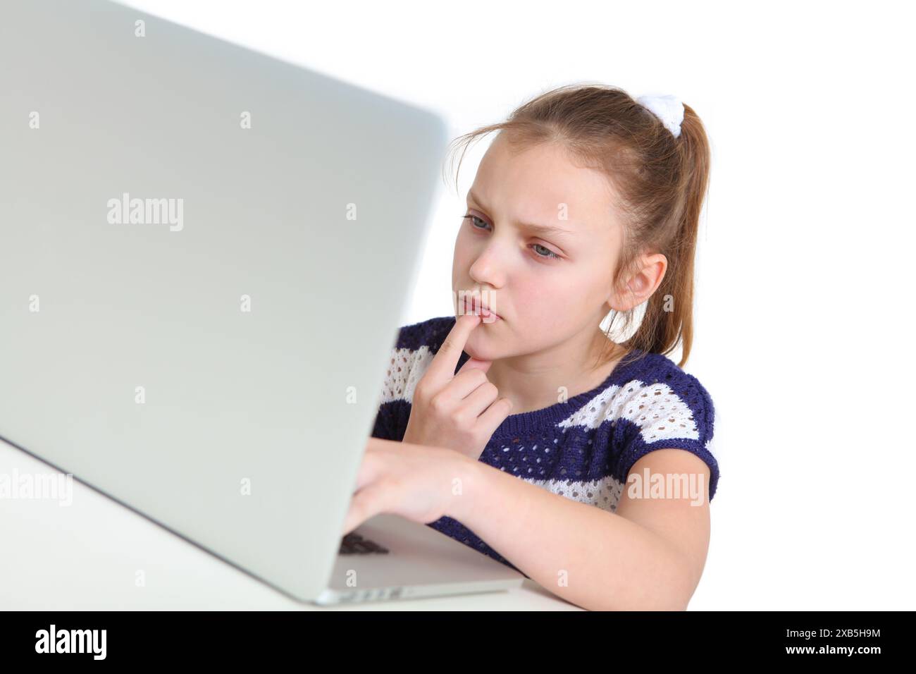 preteen girl using laptop on white background Stock Photo - Alamy