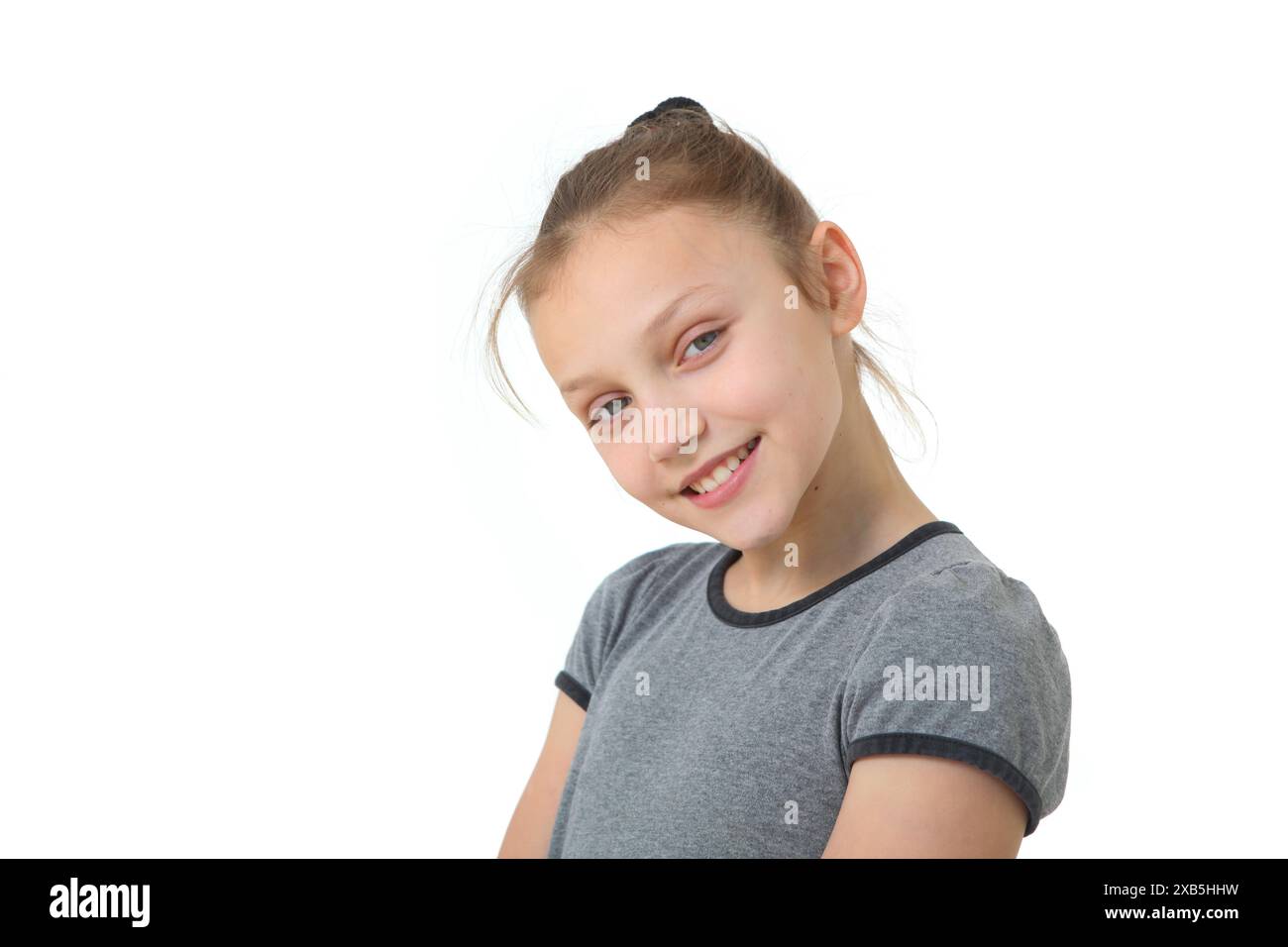 cheerful preteen girl portrait on white background Stock Photo - Alamy