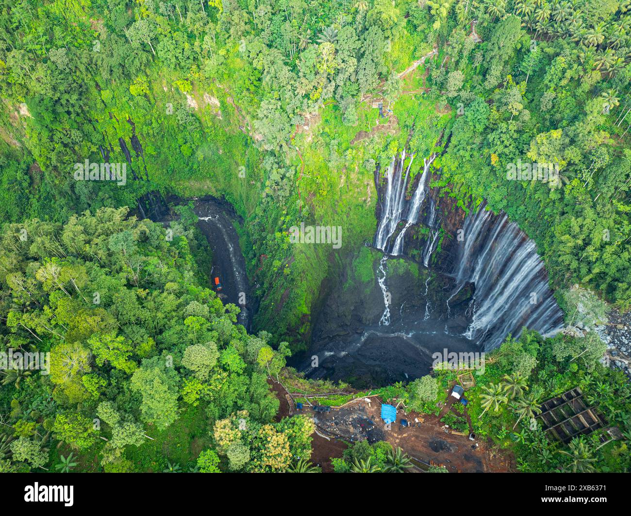 Aerial view Tumpak Sewu Waterfall The most beautiful in Indonesia. The hills and mountains in Java are full of amazing waterfalls. Thousands of waterf Stock Photo