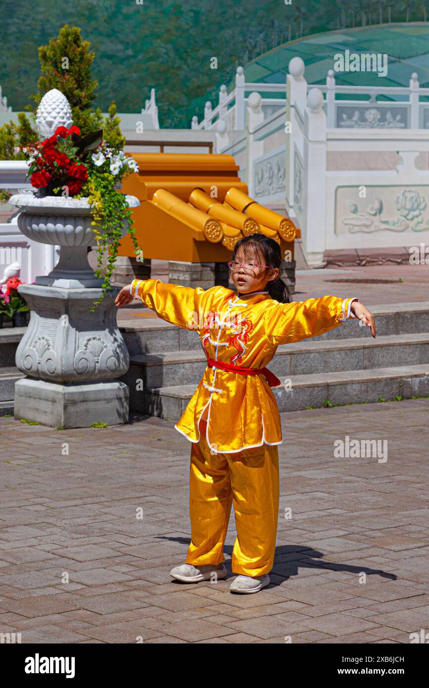 Young performer at the Lingyen Mountain Temple in Richmond British Columbia Stock Photo