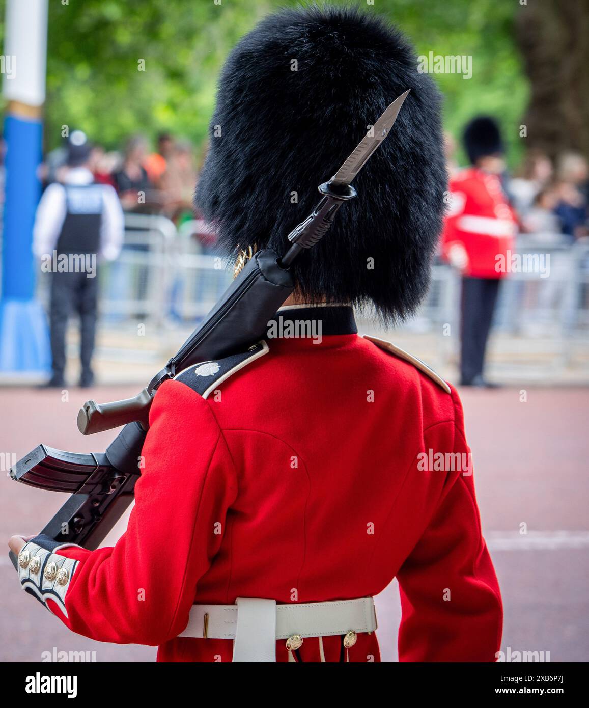 A soldier attends The Colonel's Review for the upcoming Trooping of the Colour. The Colonel's Review is identical to The Kingís Birthday Parade, with the exception that some additional mounted officers ride on the latter. Taking part will be over 1400 soldiers of the Household Division and The Kingís Troop Royal Horse Artillery, including 400 musicians from the Massed Bands, all of whom will parade on Horse Guards for the second of two formal Reviews. The Colonel's Review also includes 250 soldiers from the Foot Guards who will line the processional route along The Mall. (Photo by Loredana San Stock Photo