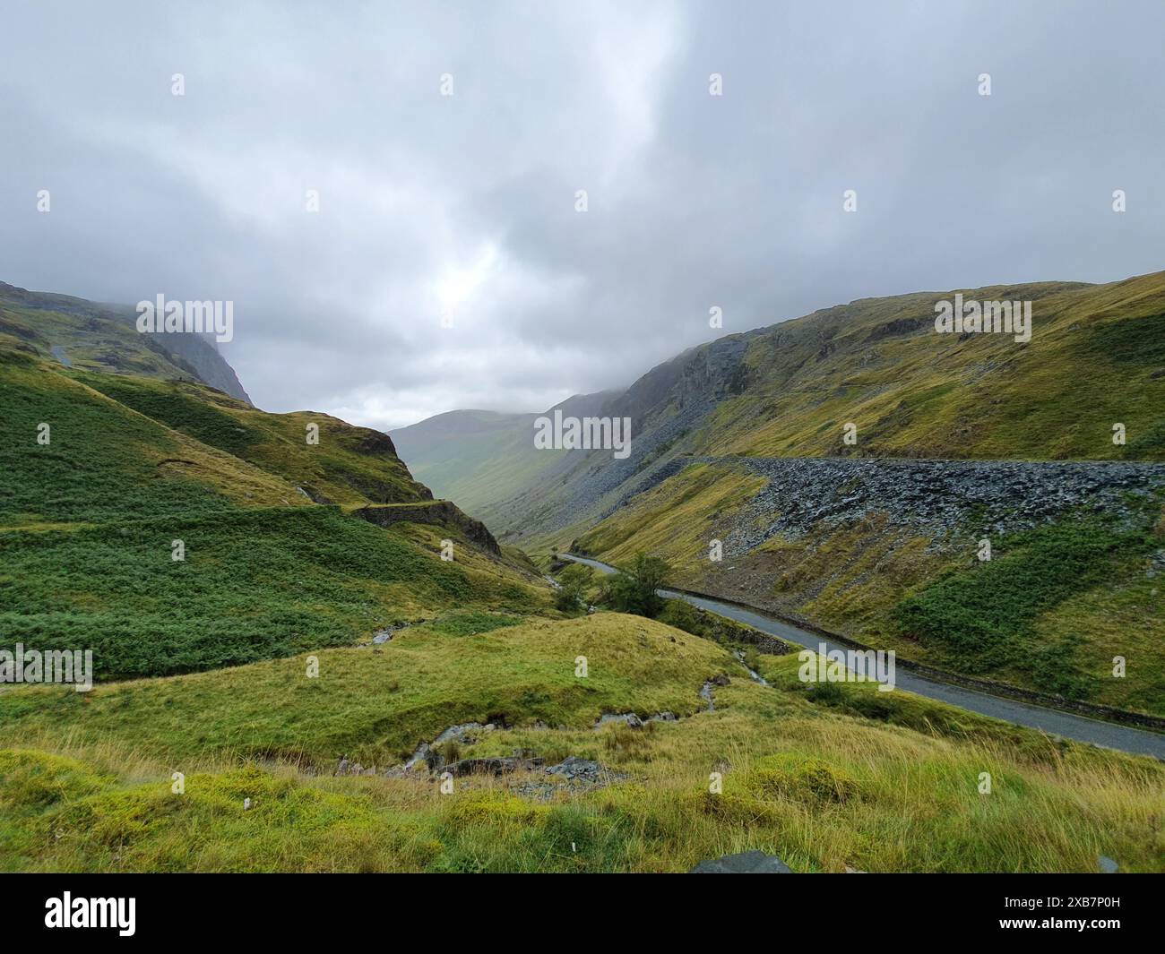 Lush green hills valley travel hi-res stock photography and images - Alamy