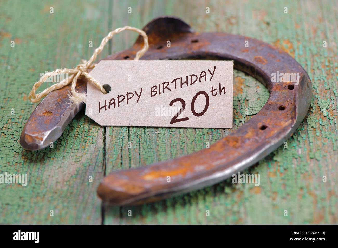 Glückwunsch zum 20. Geburtstag Glückwunschkarte zum 20. Geburtstag mit Hufeisen als Glücksbringer FOTOMONTAGE *** Happy 20th birthday greeting card wi Stock Photo