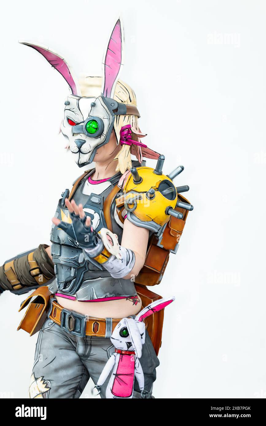 A girl in Overwatch rabbit costume wields two guns Stock Photo - Alamy