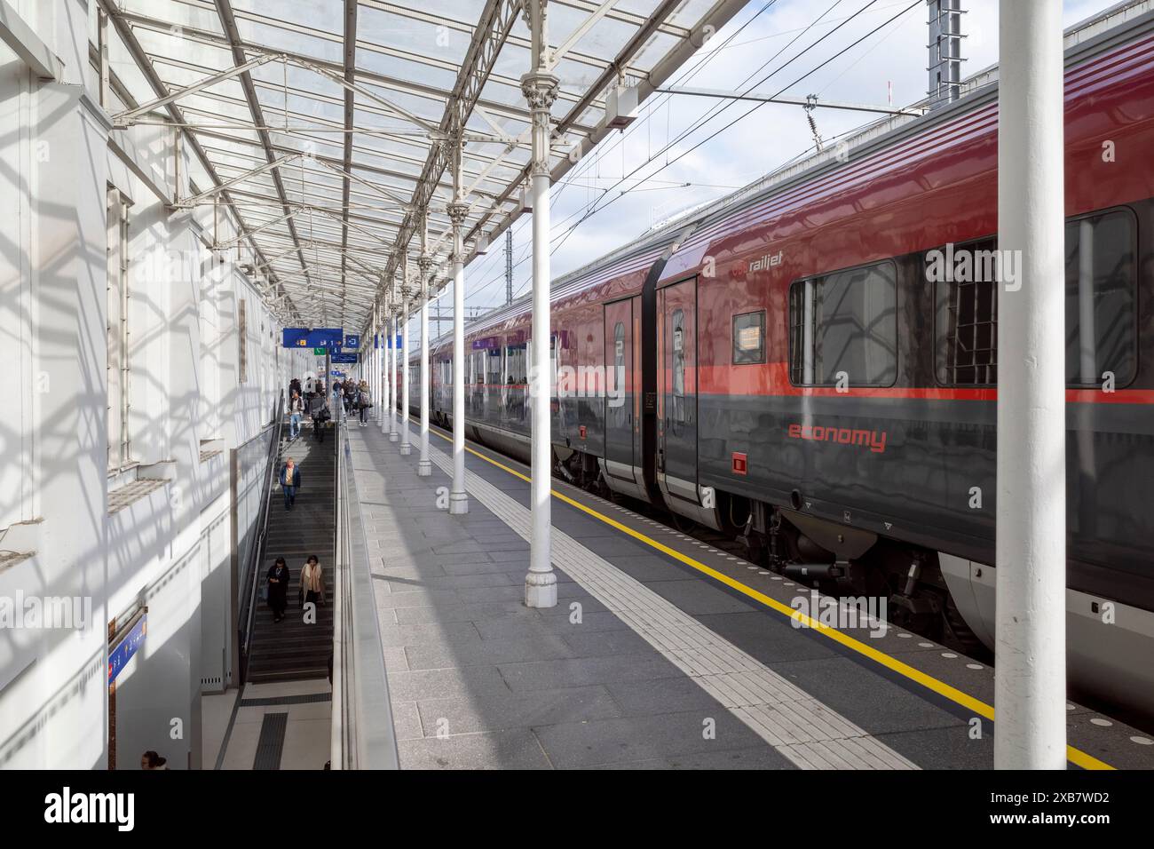 Passengers walking beside train hi-res stock photography and images - Alamy