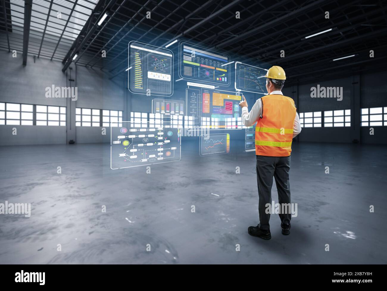 Asian worker or engineer work at warehouse with digital tablet Stock Photo