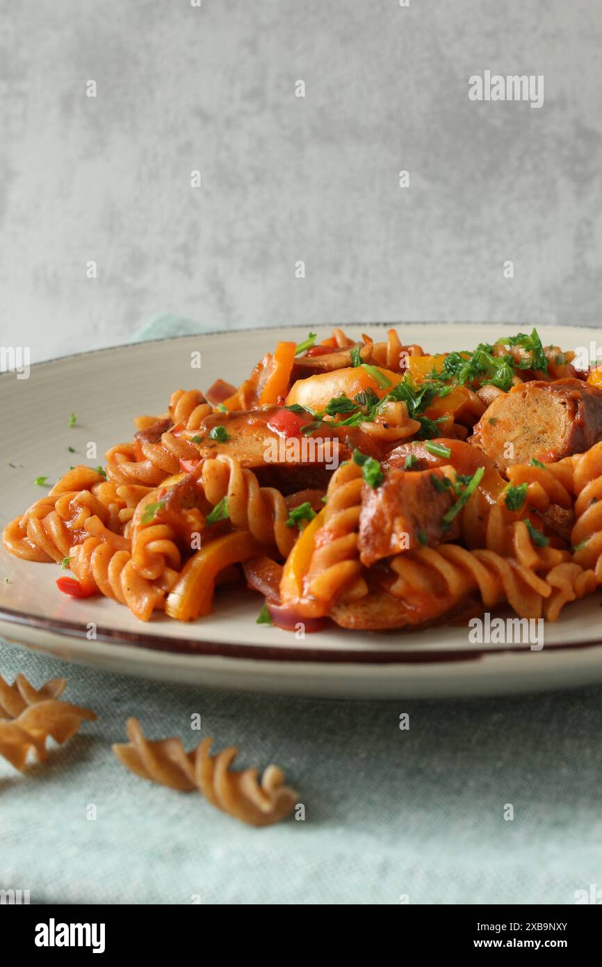 German Sausage Goulash with Whole Wheat Spiral Pasta Stock Photo Alamy