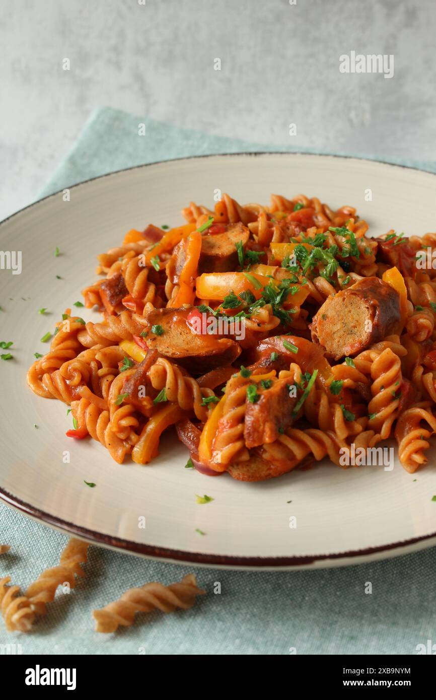 German Sausage Goulash with Whole Wheat Spiral Pasta Stock Photo Alamy