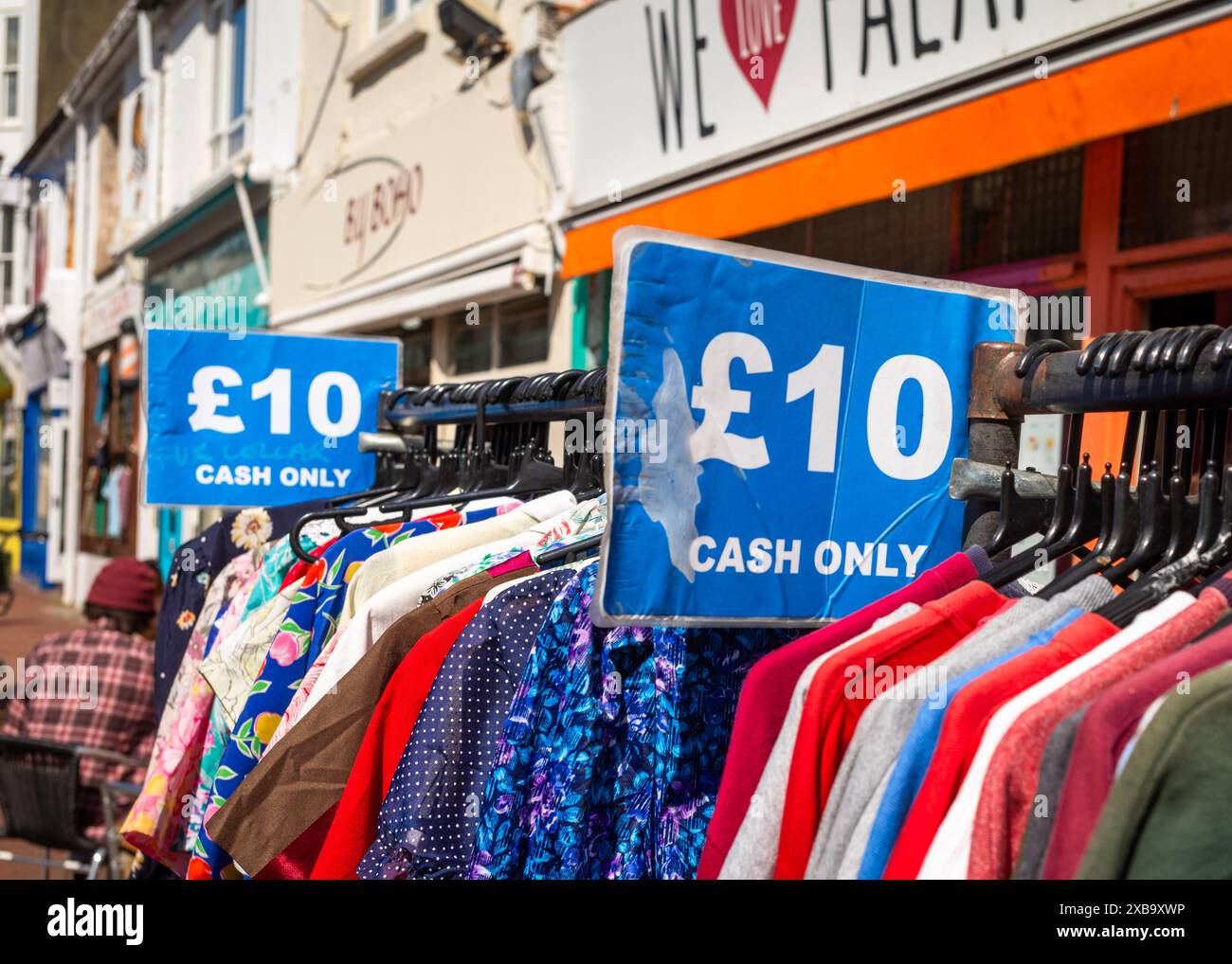 Second hand and vintage clothing for sale for £10 cash only in The Lanes in Brighton, East Sussex, UK Stock Photo