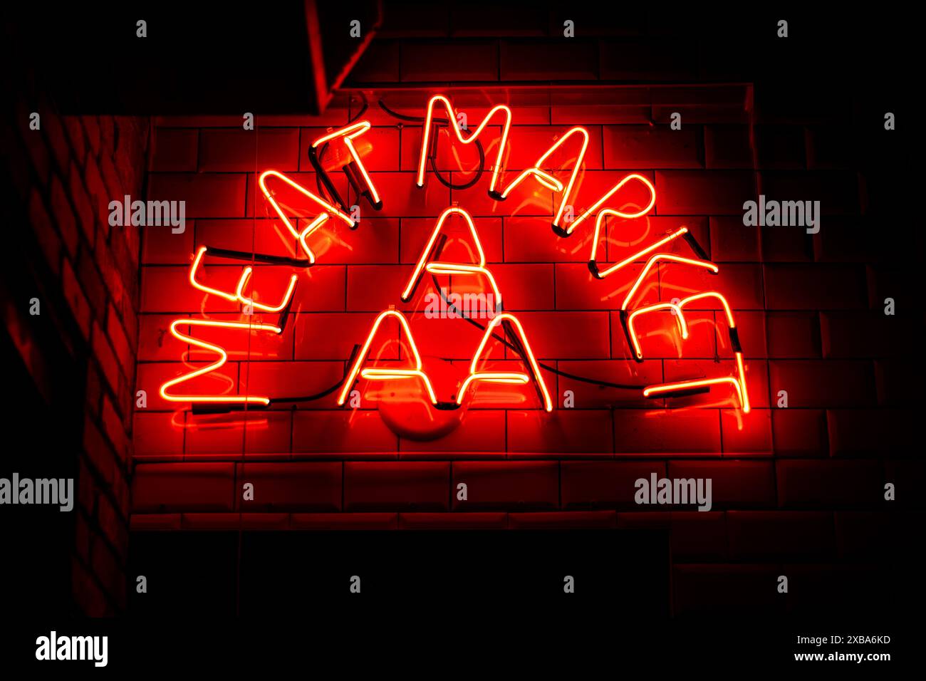 Neon signage advertising meat hi-res stock photography and images - Alamy