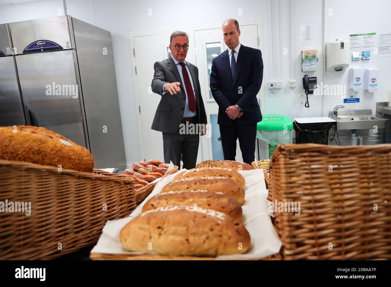 The Prince of Wales (right) during a visit to the ZERO2FIVE Food