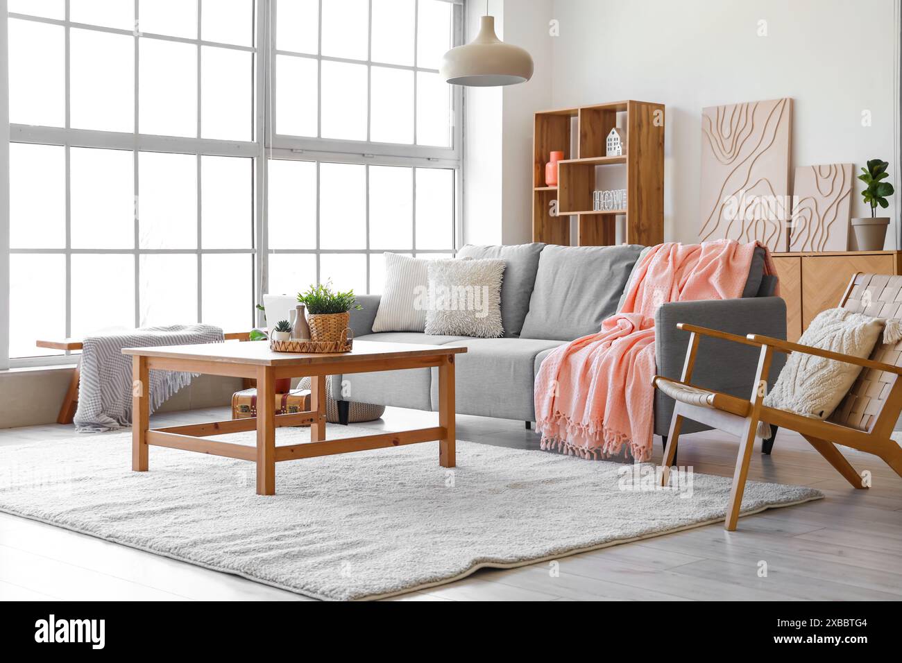 Modern interior of living room with cozy sofa, armchair and coffee ...