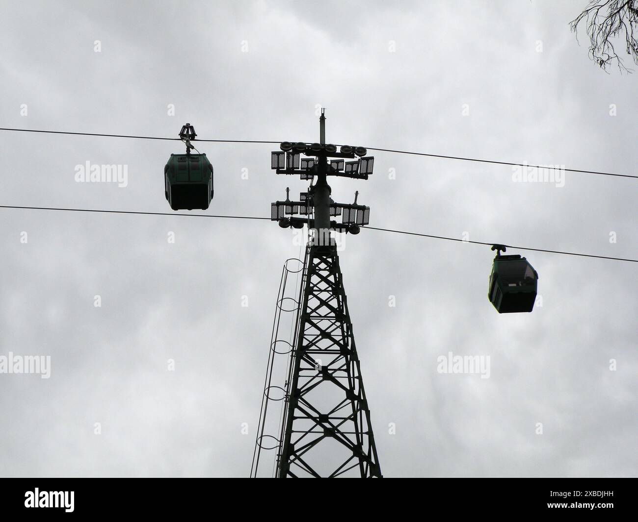 Tower and cable car cabins that transport people Stock Photo - Alamy