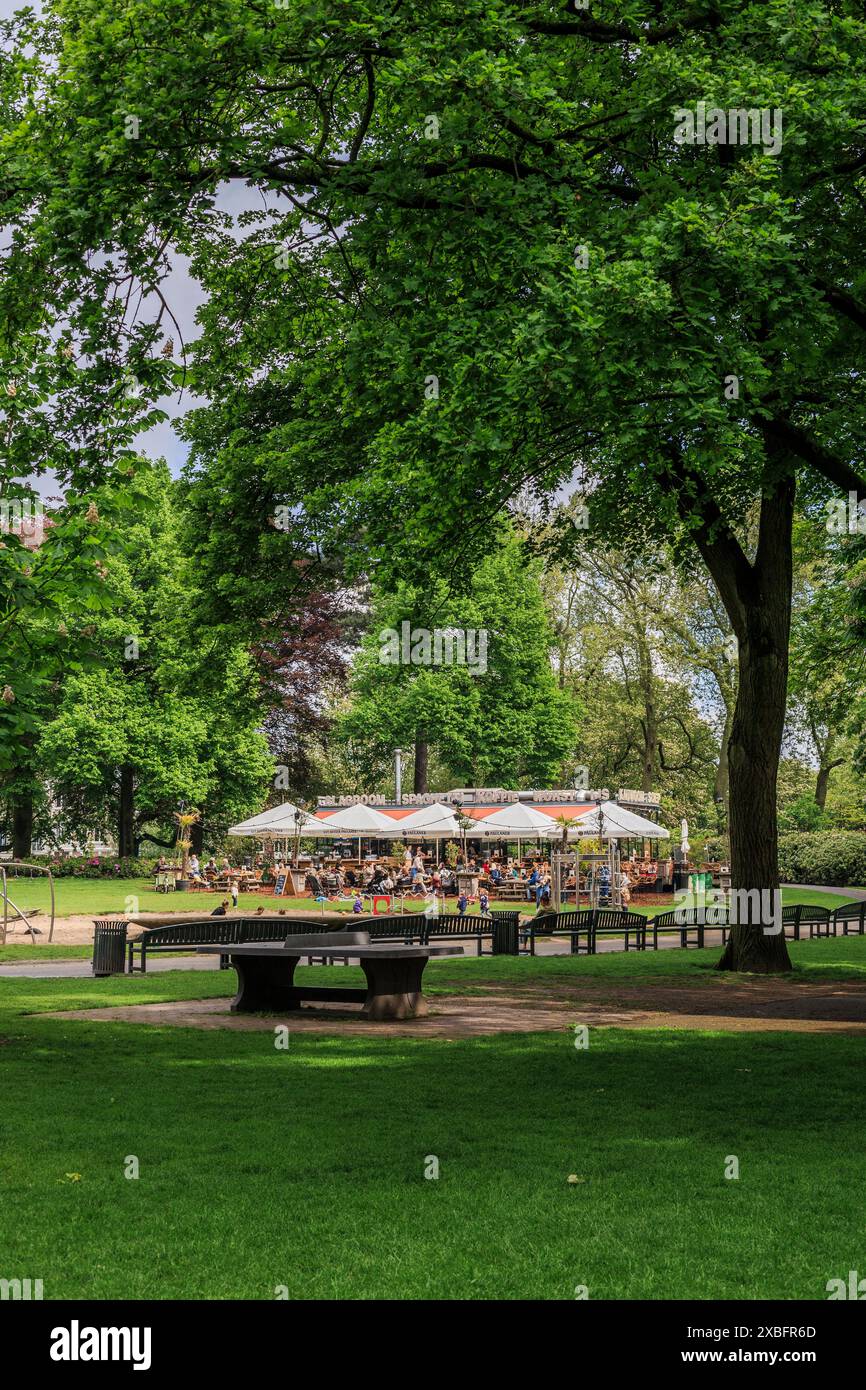 Play area and outdoor cafe in Stadspark Valkenburg, Breda, Netherlands Stock Photo