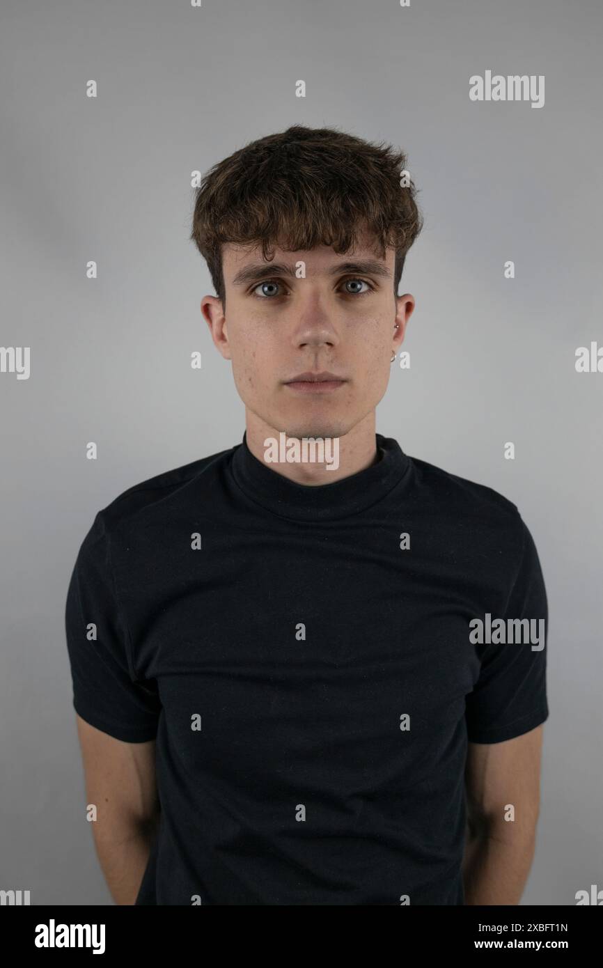 Young man portrait in a photo studio with white background Stock Photo ...