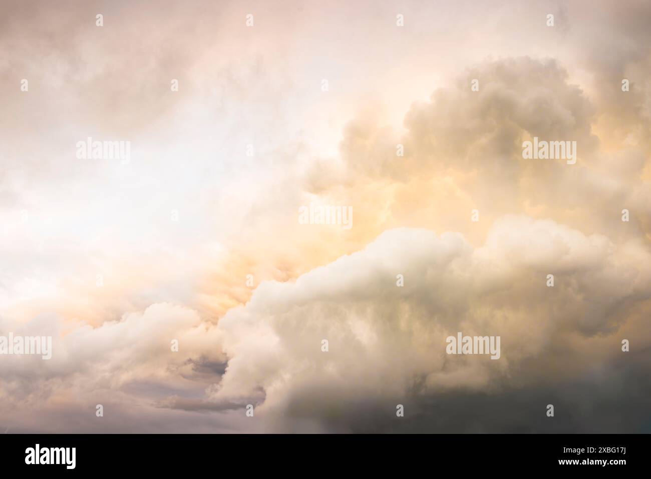 Cumulonimbus storm clouds in a dramatic stormy sky during the day. Ideal for a weather, climate or environment background Stock Photo