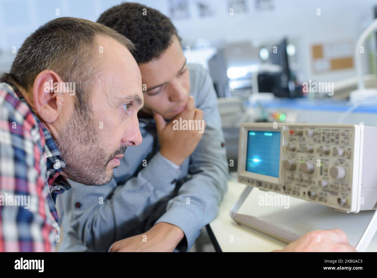 maintenance engineer programing in industry Stock Photo