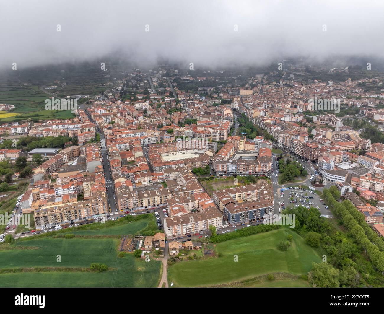 Aerial view of the city of Berga on a cloudy morning (Berguedà, Barcelona, Catalonia, Spain) ESP: Vista aérea de la ciudad de Berga en una mañana Stock Photo