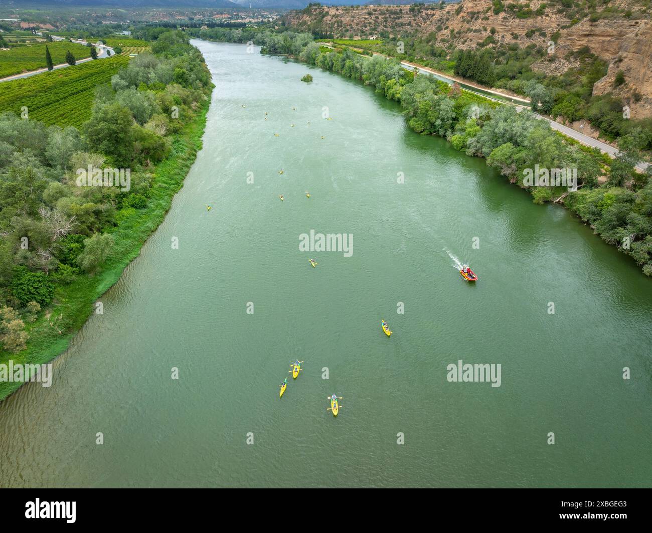 Kayaks on the Ebro River at the 23rd Canoeing of the Platform in Defense of the Ebro River (Baix Ebre, Tarragona, Catalonia, Spain) Stock Photo