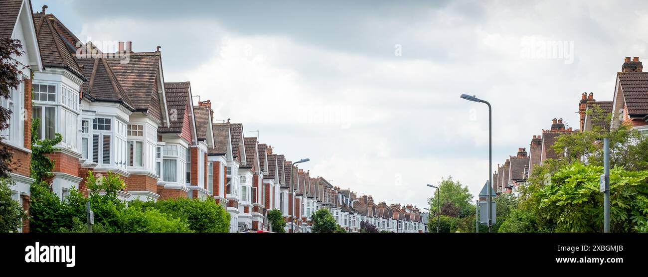 UK- Row of typical brick terraced houses in Wimbledon, south west London Stock Photo