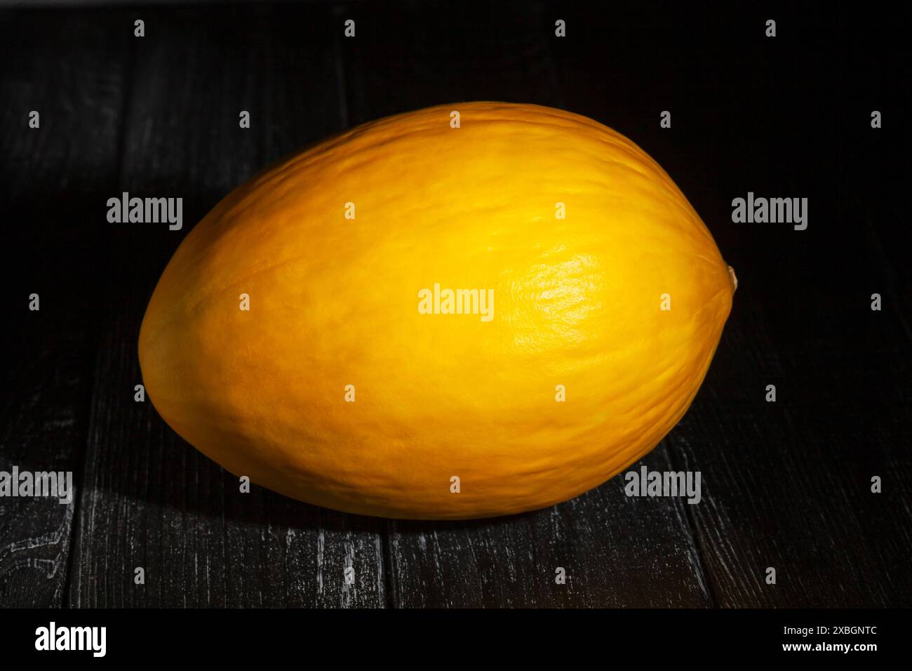 Melon On Black Wood Background Stock Photo Alamy Melon On Black Wood Background Stock Photo Alamy