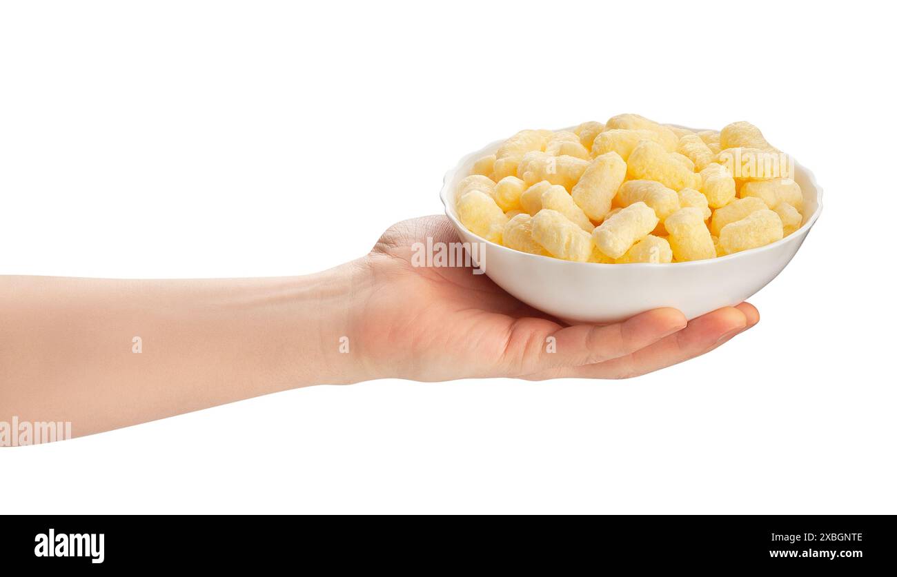 corn sticks bowl in hand path isolated on white Stock Photo
