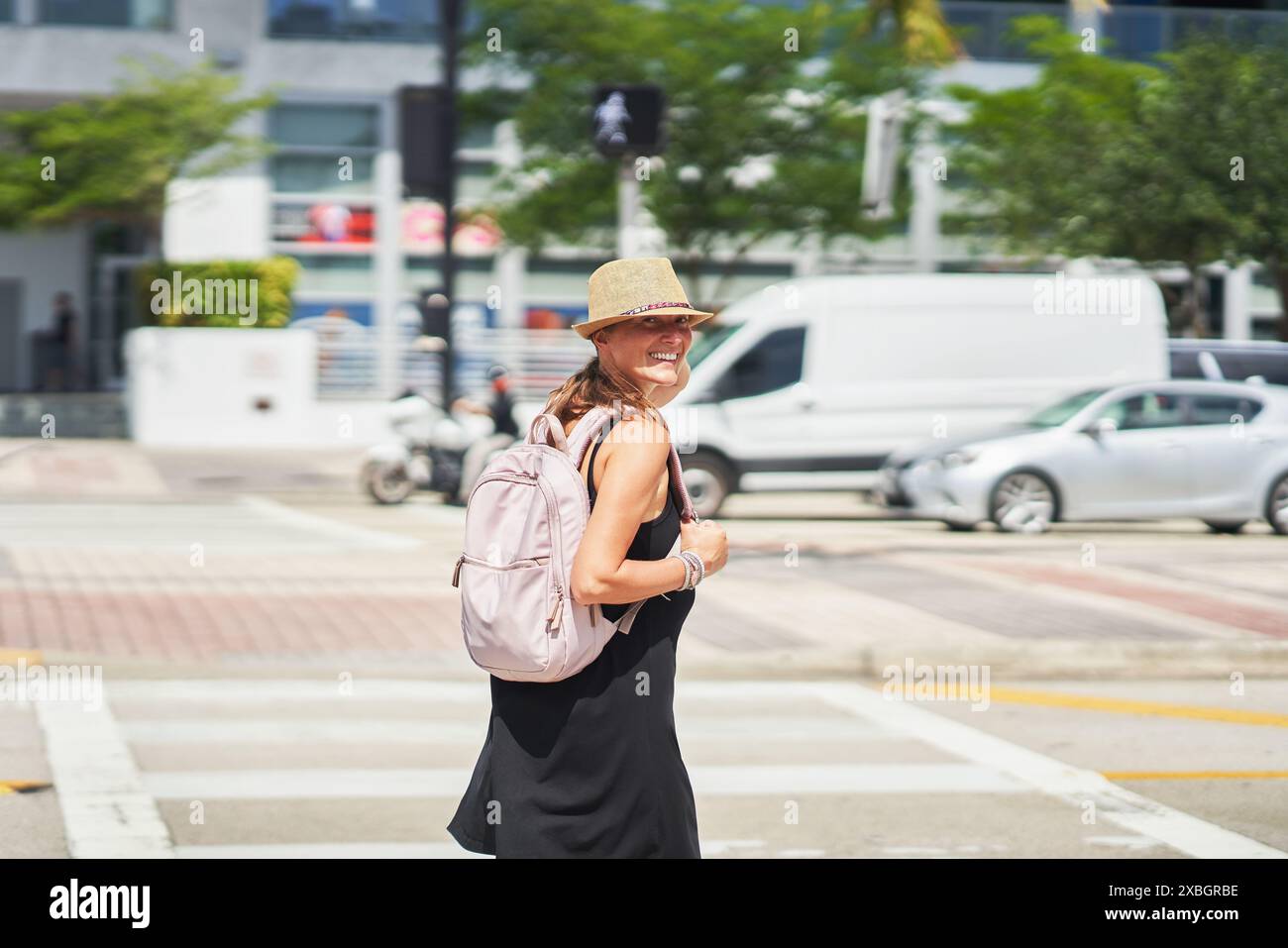 Picture from Miami of woman on a pedestrian crossing Stock Photo - Alamy