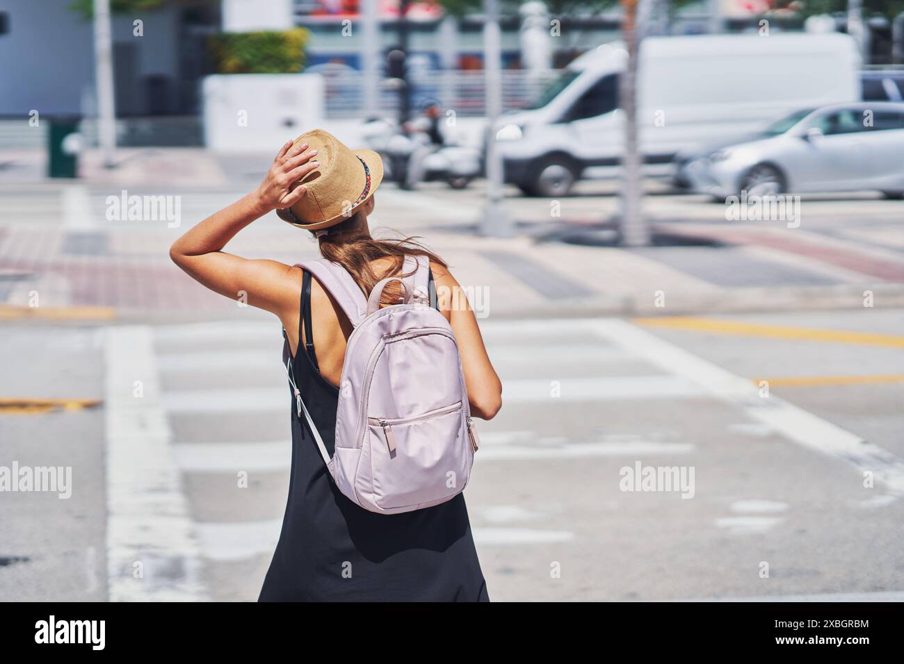 Picture from Miami of woman on a pedestrian crossing Stock Photo - Alamy