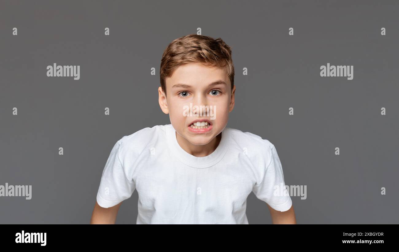 Teen boy making funny face hi-res stock photography and images - Alamy