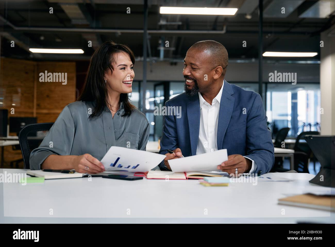 Two happy male colleagues hi-res stock photography and images - Alamy