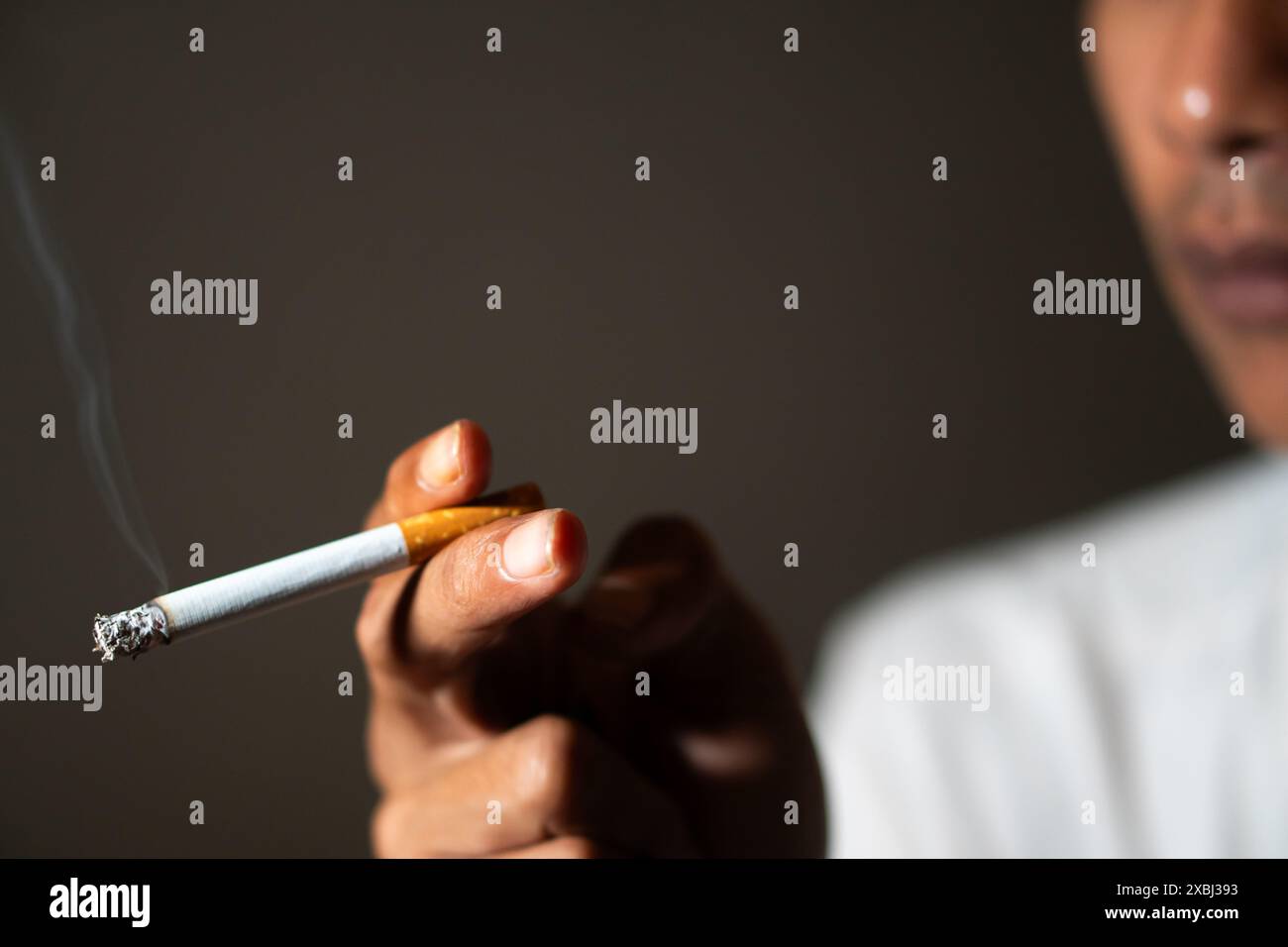 Lit cigarette tip hi-res stock photography and images