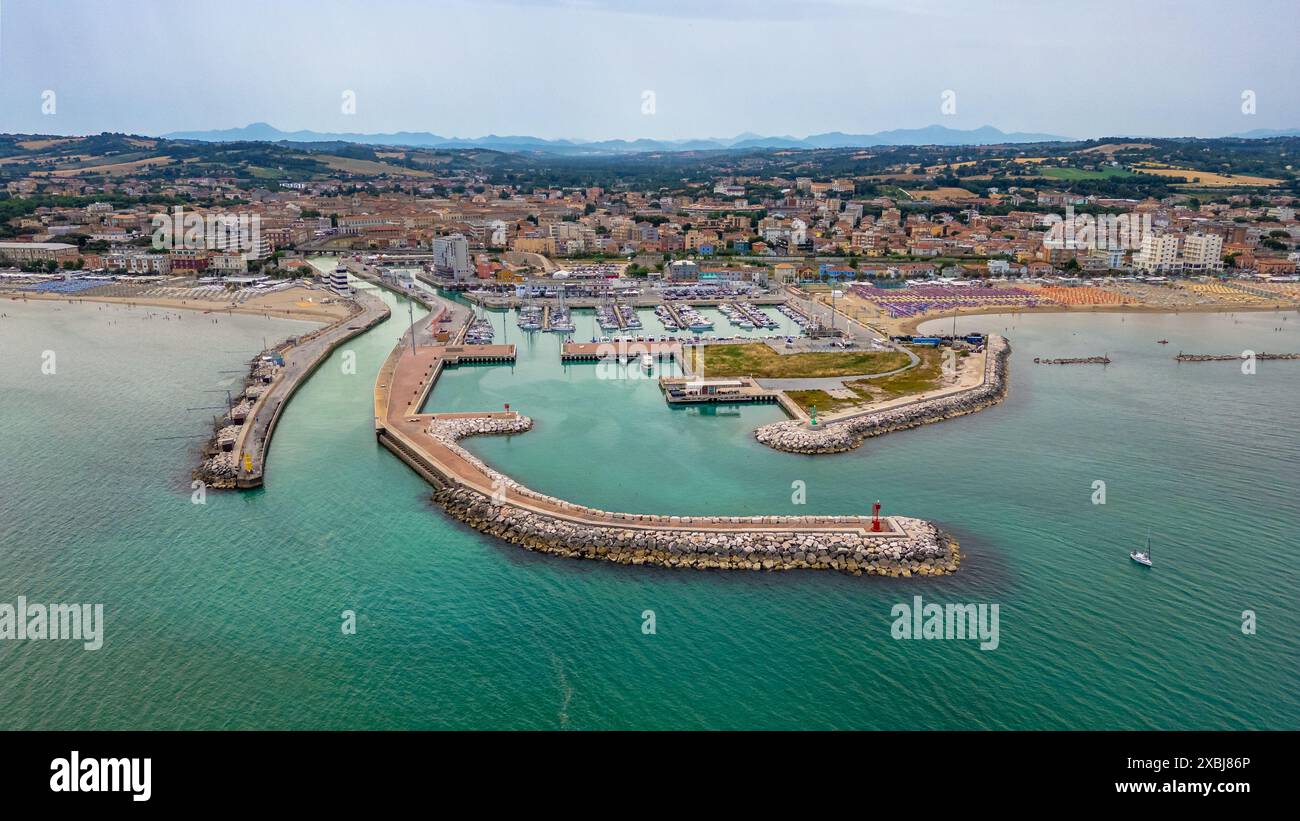 An Aerial View Of The Sea And The Velvet Beach Of Senigallia In The an-aerial-view-of-the-sea-and-the-velvet-beach-of-senigallia-in-the