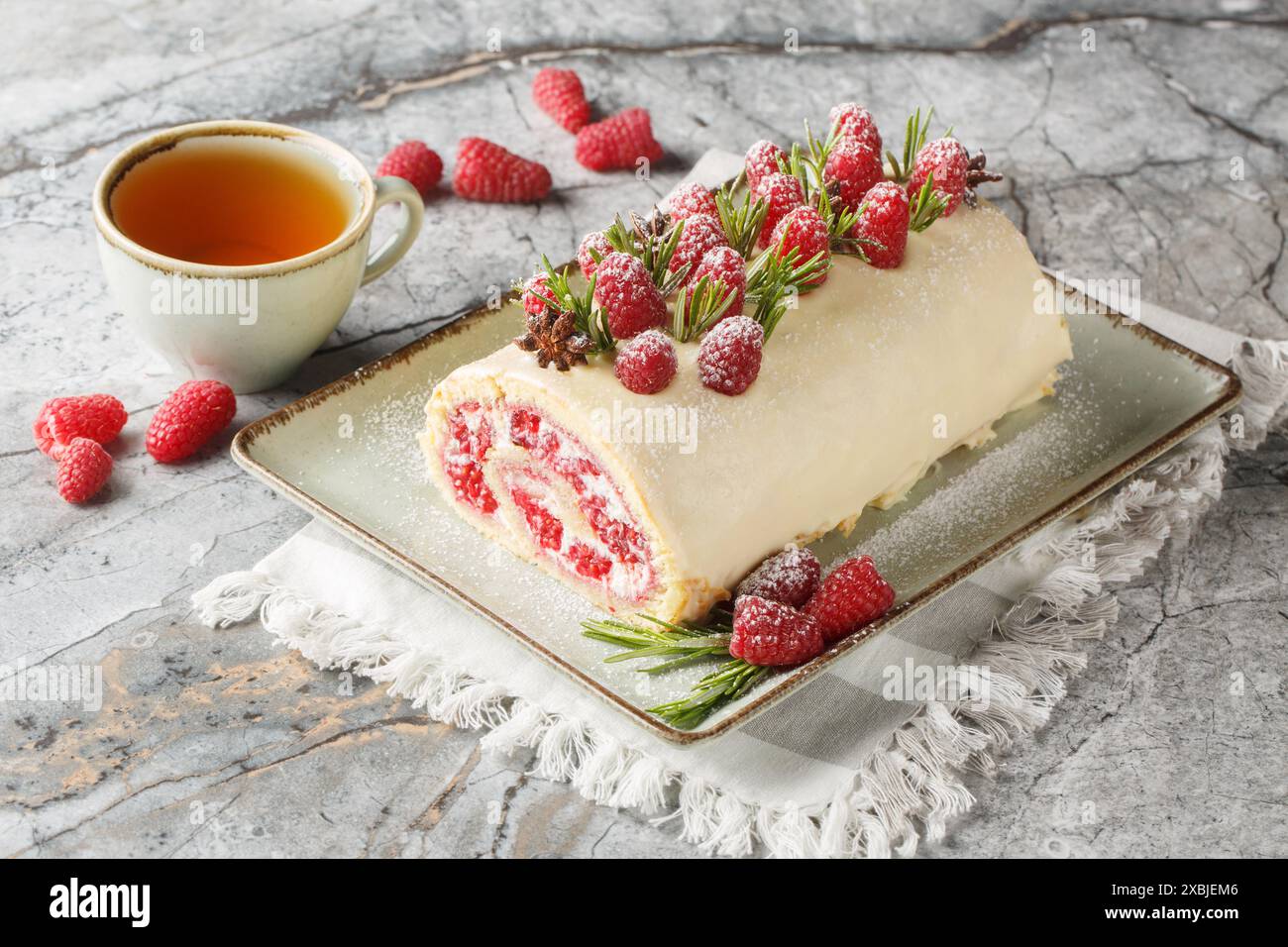 Berry sponge roll cake with jam, fresh raspberries, cream cheese ...