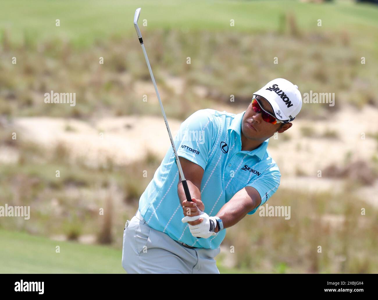 Pinehurst, United States. 12th June, 2024. Hideki Matsuyama of Japan watches his shot during a practice round at the 124th U.S. Open golf championship at Pinehurst Resort & Country Club in Pinehurst, N.C. on Wednesday, June 12, 2024. Photo by John Angelillo/UPI Credit: UPI/Alamy Live News Stock Photo