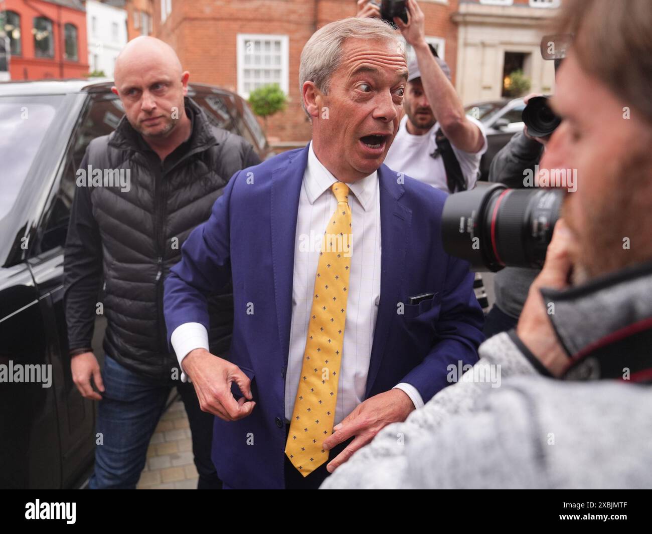Reform UK leader Nigel Farage arrives at a fundraiser for Donald Trump, hosted by former Neighbours star Holly Valance, in London. Picture date: Wednesday June 12, 2024. Stock Photo