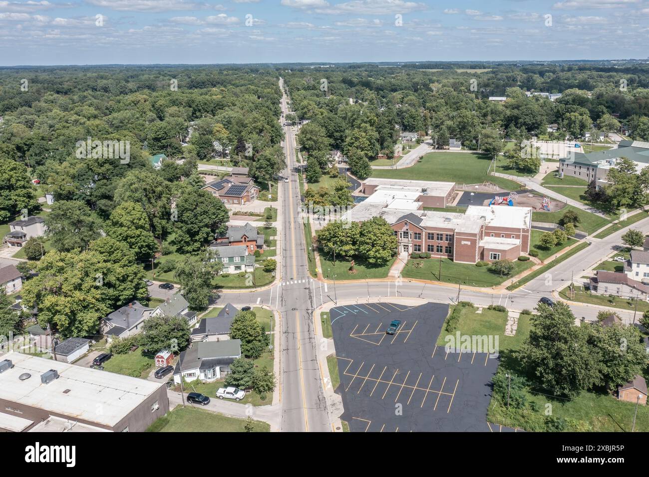 An Aerial view of the Goshen Middlebury road as it heads northeast past Chamberlain Elementary School in Goshen Indiana Stock Photo