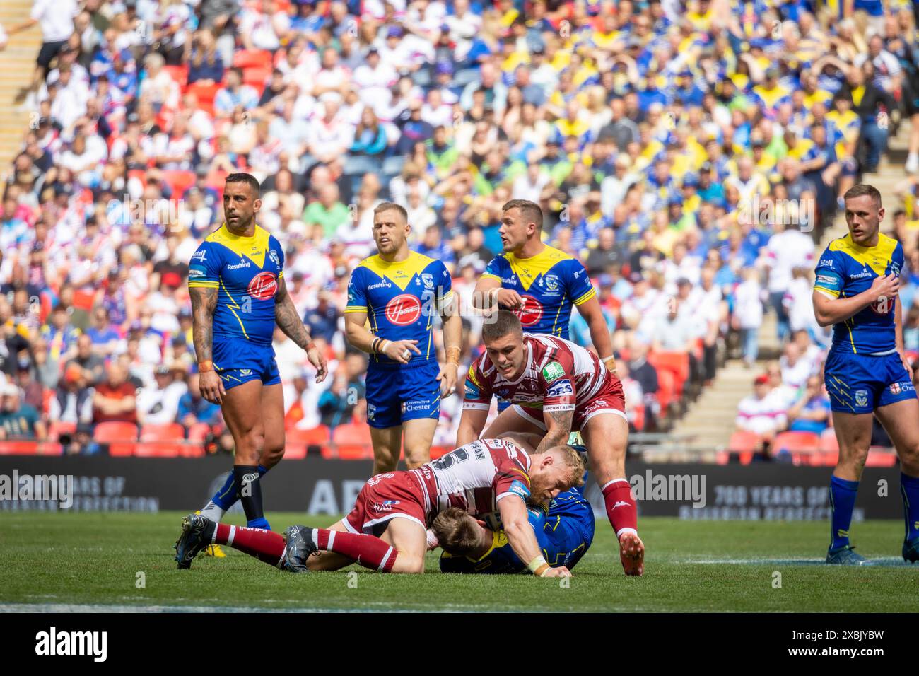 The 2024 Betfred Challenge Cup Final. Matty Nicholson is tackled Stock Photo