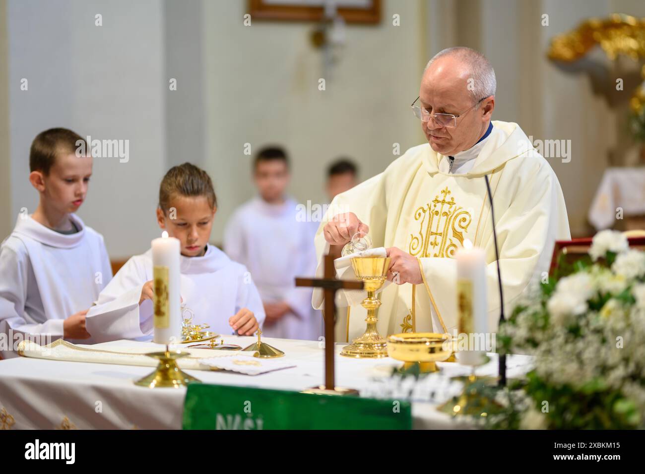 Preparation of the offerings during the Holy Mass Stock Photo - Alamy