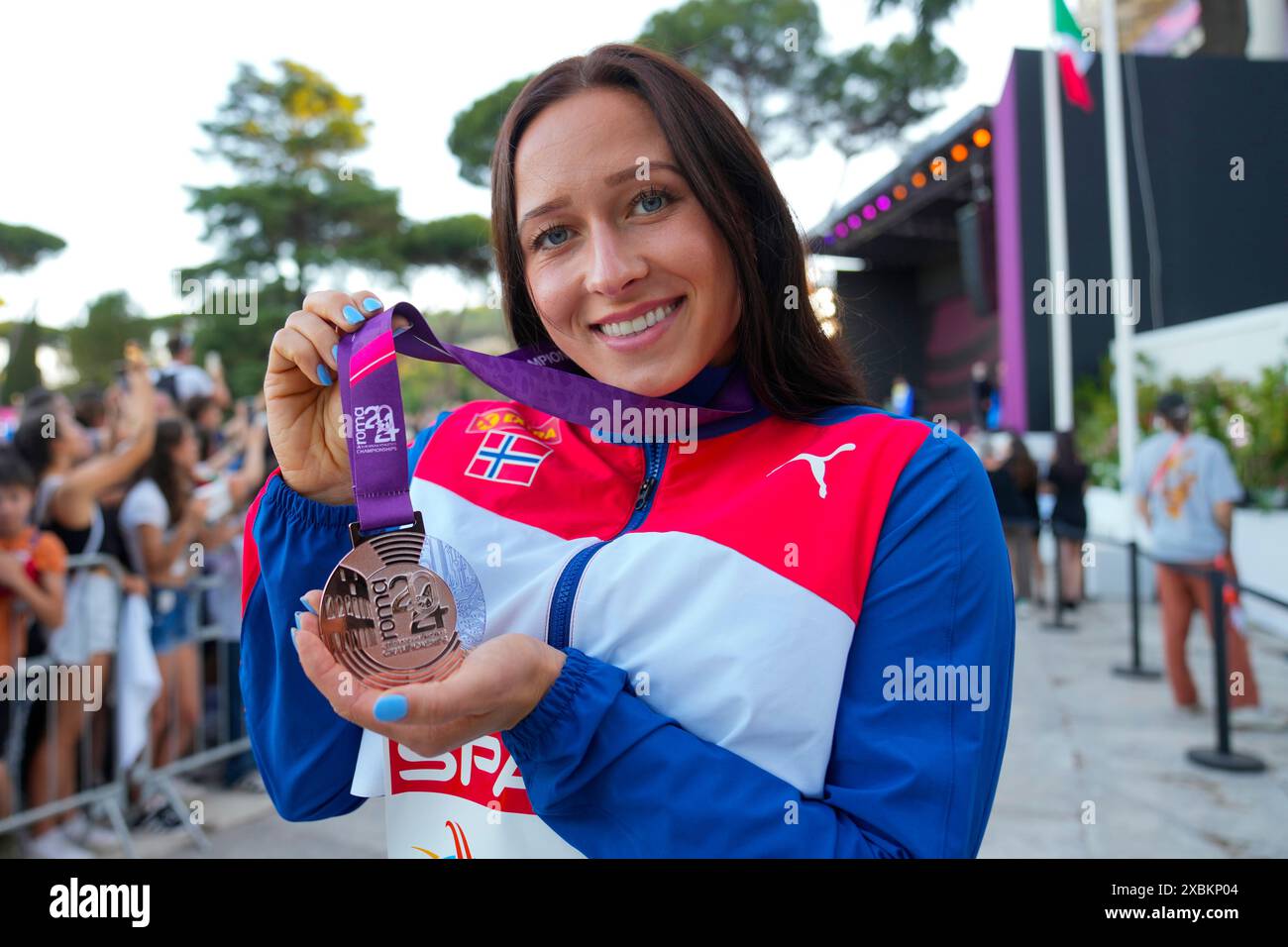 Rome, Italy 20240612. Javelin thrower Marie Therese Obst with her