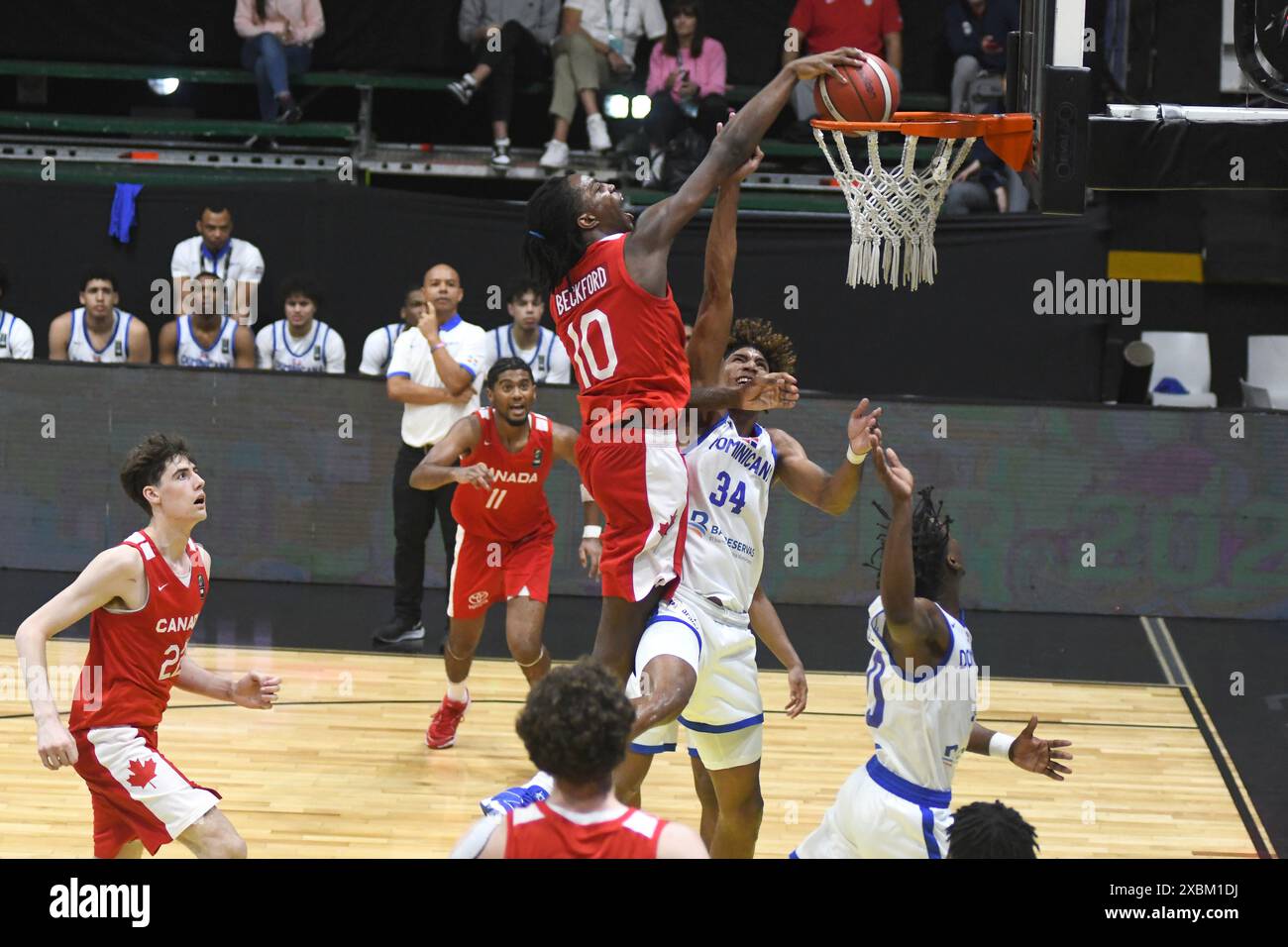 Tristan Beckford (Canada) dunking against Dominican Republic. FIBA