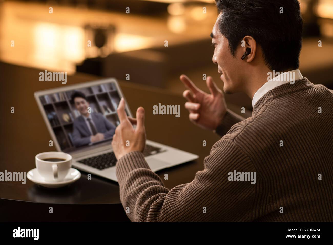Talking over video conference hi-res stock photography and images - Alamy