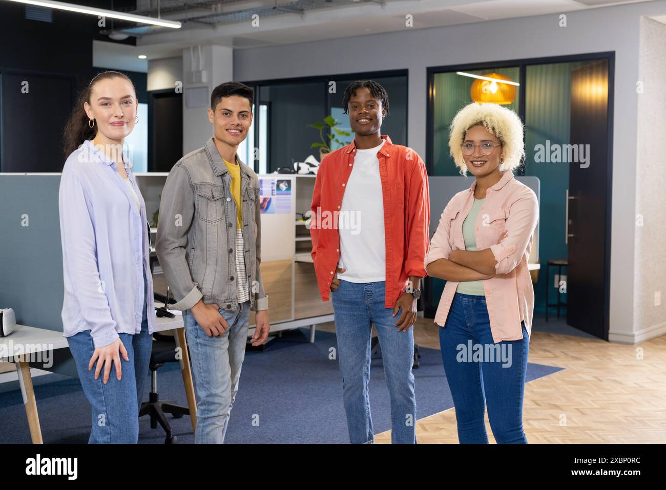 Diverse Business colleagues standing together in a modern office ...